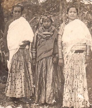 Newar bride flanked by two women in 1941.