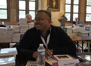 Jake Lamar signing at the 7th Interpol'Art Festival in Reims , in October 2012.