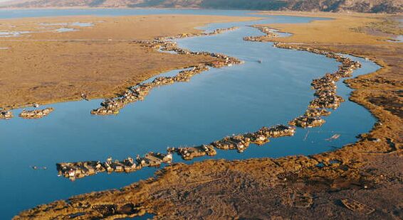 The constellation of the Uros Floating Islands as seen from the air, about 5km off the coast of Puno.