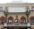 Villa Venezia's facade representing two of his sons: Osvald and Walter. In the middle a damaged statue of Albrecht Dürer is recognisable.