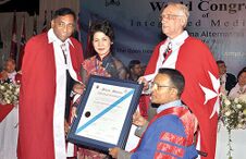 Recognition – A humanitarian award presented to Dr. Perera in November 2011 by Professor Dr. Dame Nguyen Theresa, International Vice Chancellor of OIUCM, Victoria Australia; Professor Dr. Sir John Hopson – Grand Master of the Knights of Charity, England; and Professor Dr. Sir Mayisvren Ellappen – Dean, Faculty of Complementary Medicines, Allianze University College of Medical Sciences, Malaysia.[57]