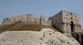 Wall towers and square gate tower at the Citadel of Aleppo.