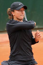 Iga Świątek, the 2024 women's singles champion. It was her fifth major title and her fourth at the French Open.