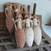 Bronze Age amphorae from shipwrecks near Bodrum, Turkey, with rack and roping device illustrating how they might have been kept from shifting