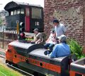 Closeup of the locomotive of the riding train.