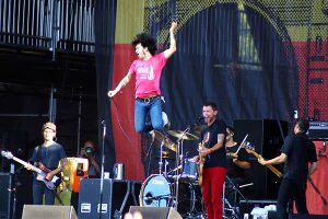 At the Drive-In live in 2012. From left to right: Rodríguez-López, Bixler-Zavala, Ward, Hajjar, and Hinojos.