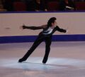 Clockwise back crossover, during the scissoring motion after the wide step. (Johnny Weir)