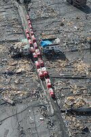 Emergency vehicles staging in the ruins of Otsuchi following the tsunami