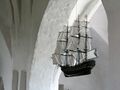 A model ship (probably expressing thanks for help during a storm) hanging in a Söderköping church