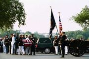 The casket of former President Ronald Reagan is transferred from a hearse to a caisson at 16th Street and Constitution Avenue in Washington, D.C. on June 9, 2004.