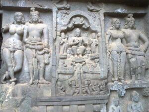 Entrance, right panel with Mithuna couples, and central Mahayana-period panel.[22]