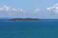 Palominos seen from East, the coast of Fajardo in the background