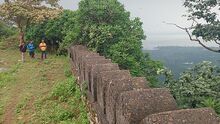 Wall of Fort and Dhanraul Dam in background