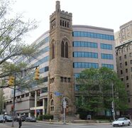 The 1889 bell tower from the former Bellefield Presbyterian Church is all that remains in front of the University of Pittsburgh's Bellefield Towers building