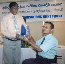 Felicitation – The Disability Organisations Joint Front Sri Lanka (DOJF) presented Perera with a special plaque at a felicitation ceremony held at Hotel Renuka Colombo on Saturday 11 June 2010, in appreciation of his outstanding contributions promoting Social Inclusion for All.[56]